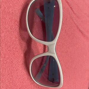 Tommy Bahama white and teal
Sunglasses